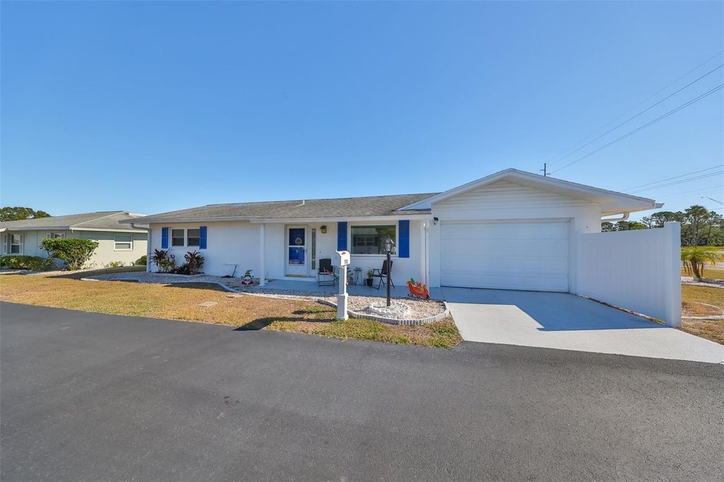 Photo of 703 Rutgers Place, Sun City Center, FL 33573 (MLS # TB8406258)