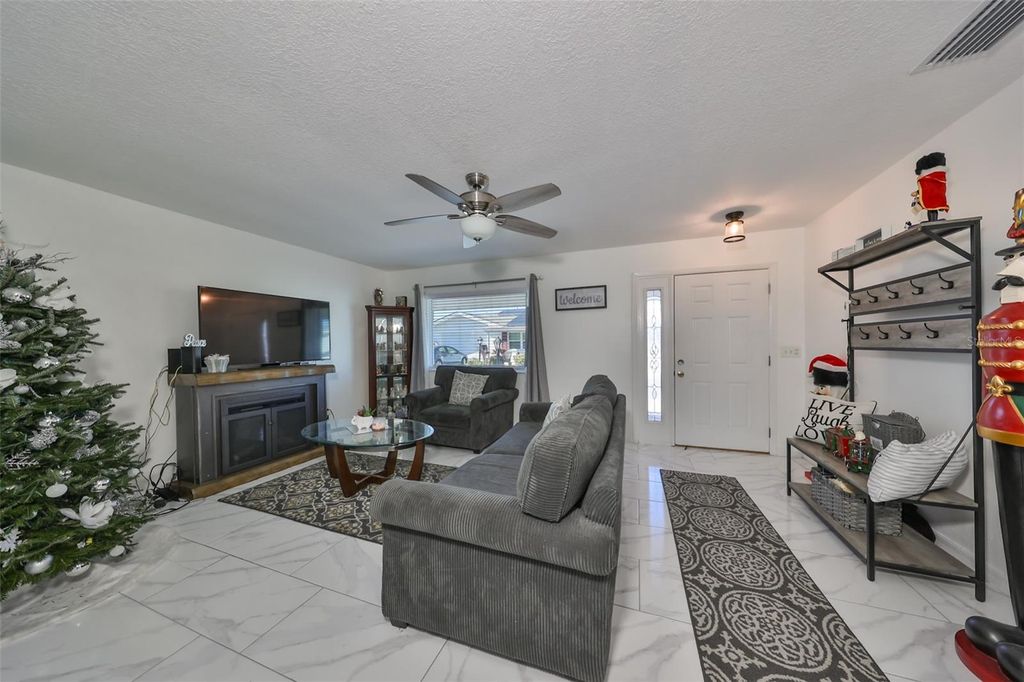 Photo of 703 Rutgers Place, Sun City Center, FL 33573 (MLS # TB8406258)