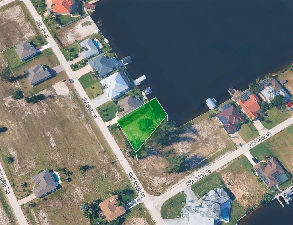 Photo of 4323 NW 28th St, Cape Coral, FL 33993 (MLS # O6391624)
