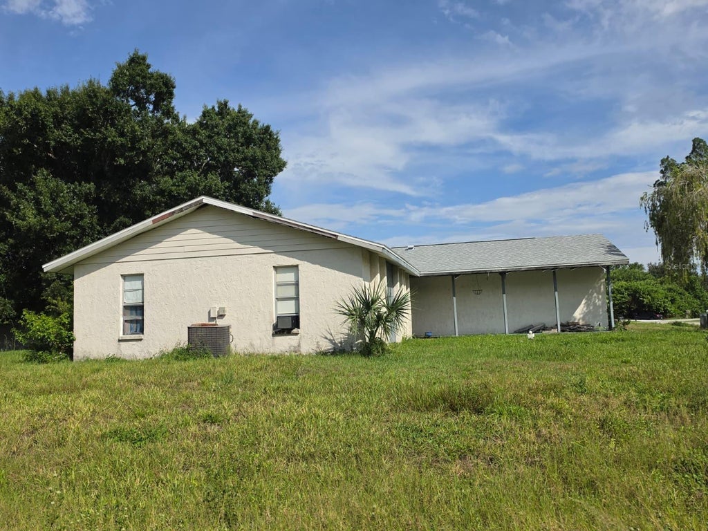 Photo of 586 Altoona Street NW, Port Charlotte, FL 33948 (MLS # A4700690)