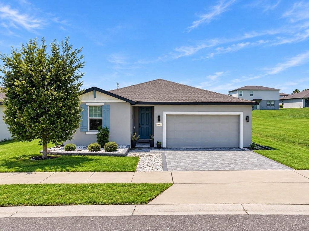 Photo of 1282 Citrus Landings Boulevard, Davenport, FL 33837 (MLS # O6440301)