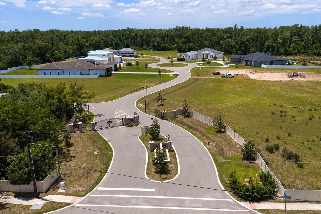 Photo of 297 Magnolia Acres Court, Lutz, FL 33548 (MLS # TB8505405)