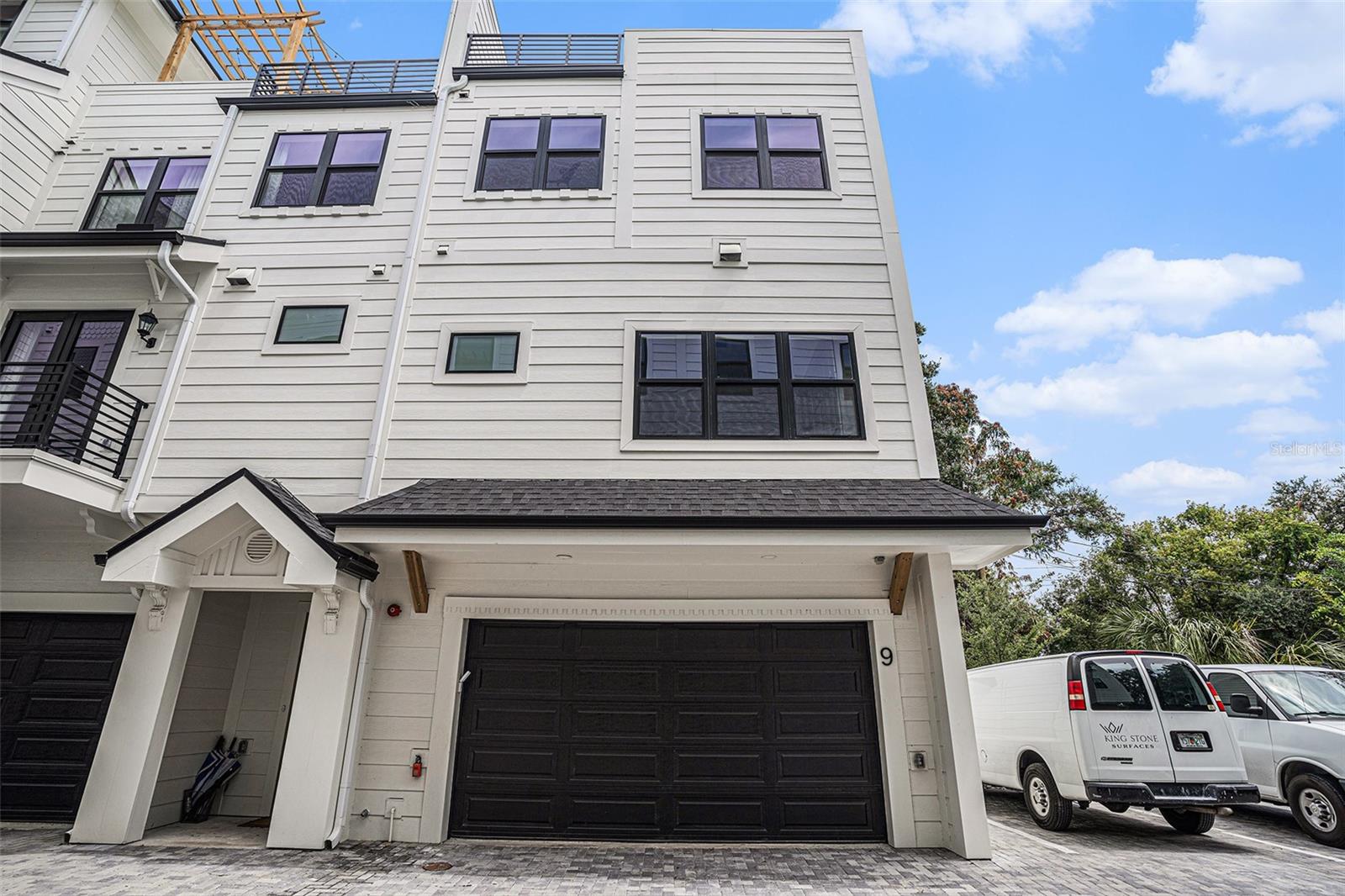 Nestled in the heart of Tampa Heights—one of the city’s most dynamic and rapidly growing neighborhoods—this stunning 4-bedroom, 4-bathroom townhouse with a 2-car garage delivers modern luxury, designer finishes, and unbeatable convenience. Spread across multiple levels, the home boasts soaring ceilings, rich hardwood floors, a gourmet kitchen with quartz countertops and stainless steel appliances, a flexible bonus room, and a private rooftop deck with sweeping skyline views—perfect for entertaining or unwinding.
Enjoy the perks of private parking. From concerts and hockey games to scenic parks, coffee shops, museums, pubs, and fine dining, everything is at your doorstep. Just two blocks from Armature Works, you’ll have access to 15 curated eateries, a rooftop bar, and year-round entertainment.
With walkable access to local restaurants, craft breweries, and the picturesque Tampa Riverwalk, you’ll be immersed in the area’s vibrant culture. Spend weekends exploring Historic Ybor City, shopping at Hyde Park Village, or taking in performances at the Straz Center and exhibits at the Tampa Museum of Art. Upscale retail at International Plaza, easy access to I-275, I-4, and the Selmon Expressway, and a 20-minute drive to Tampa International Airport make commuting and travel effortless. You’re also minutes from major attractions like Amalie Arena, Raymond James Stadium, Busch Gardens, ZooTampa, and the award-winning Gulf Coast beaches.
Part of an exclusive enclave of just 15 newly built city homes, this residence offers the perfect balance of comfort, style, and urban living. Don’t miss your chance to experience the best of Tampa Heights—schedule your private tour today!