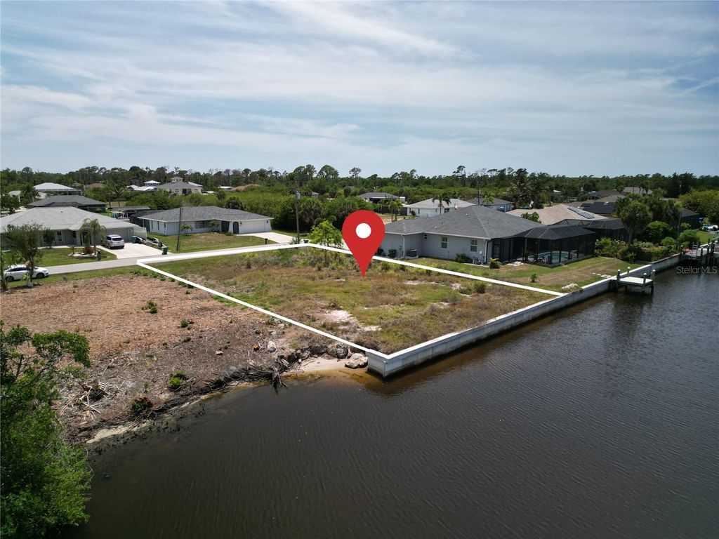 Photo of 12414 Quinlan Avenue, Port Charlotte, FL 33981 (MLS # C7526053)