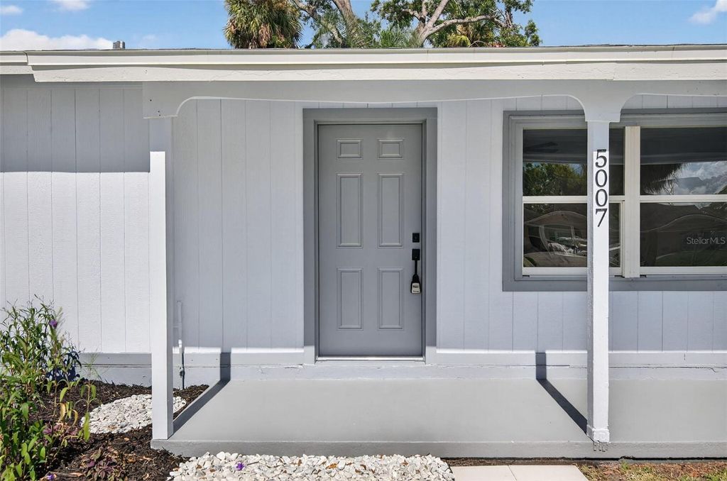 Photo of 5007 Stolls Avenue, Tampa, FL 33615 (MLS # O6365498)