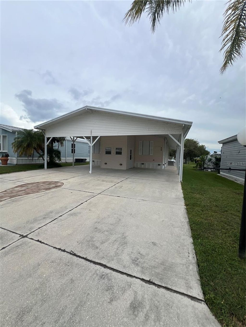 Photo of 1601 Us Highway 441 SE #99, Okeechobee, FL 34974 (MLS # OK225557)