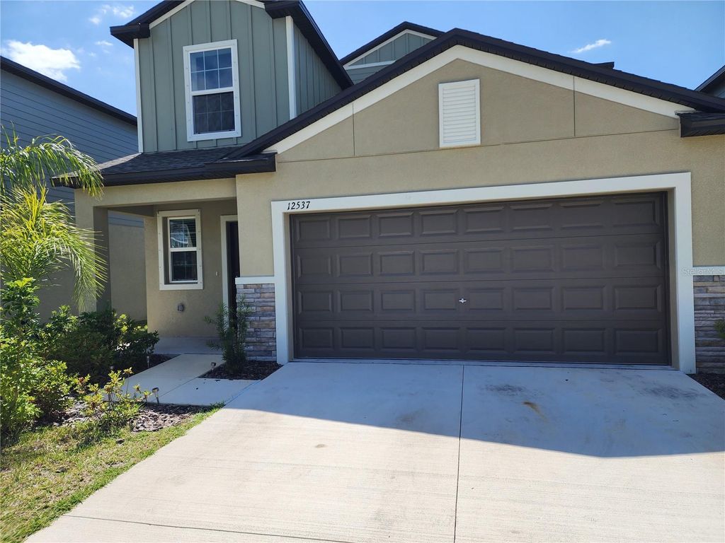 Photo of 12537 Timber Moss Lane, Riverview, FL 33579 (MLS # TB8379472)