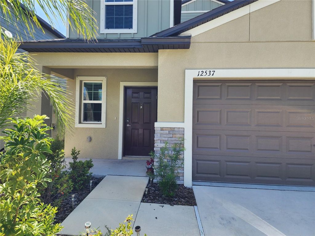 Photo of 12537 Timber Moss Lane, Riverview, FL 33579 (MLS # TB8379472)