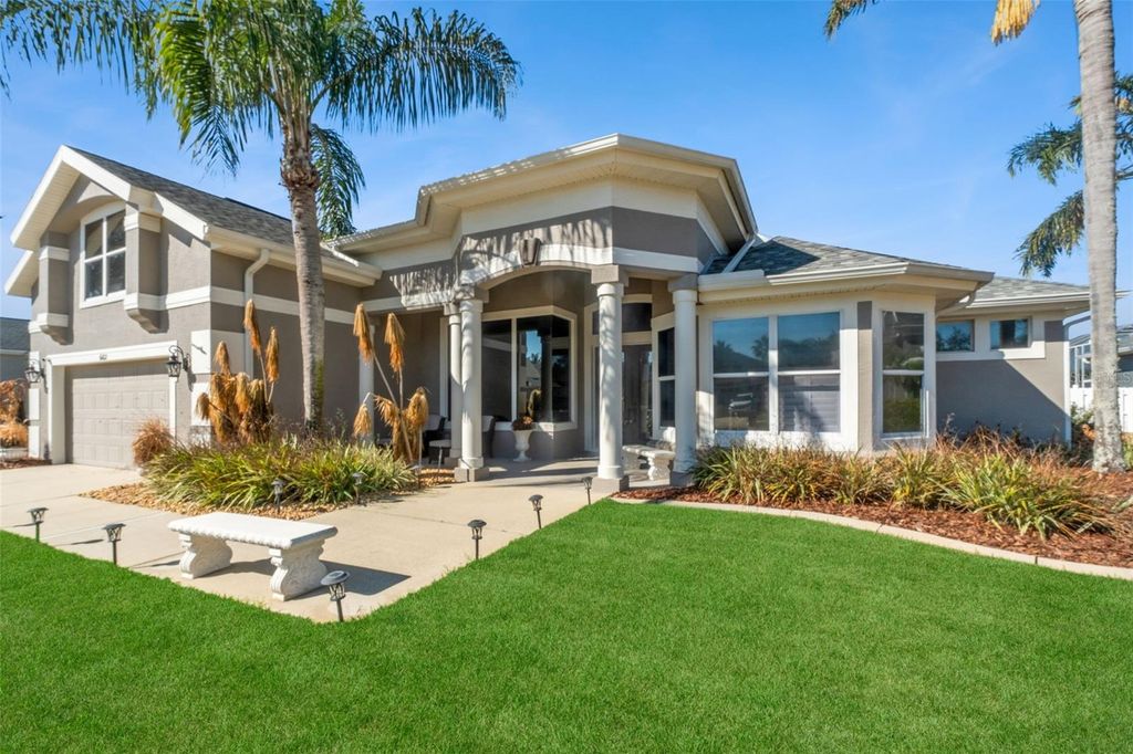 Photo of 6102 Sanctuary Garden Boulevard, Port Orange, FL 32128 (MLS # O6365971)