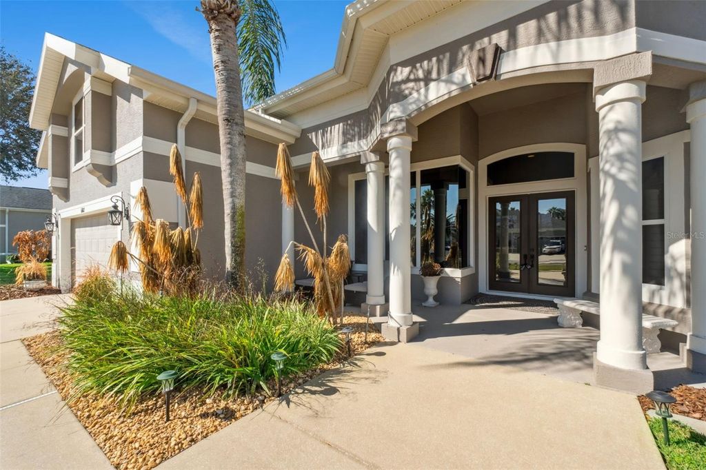 Photo of 6102 Sanctuary Garden Boulevard, Port Orange, FL 32128 (MLS # O6365971)