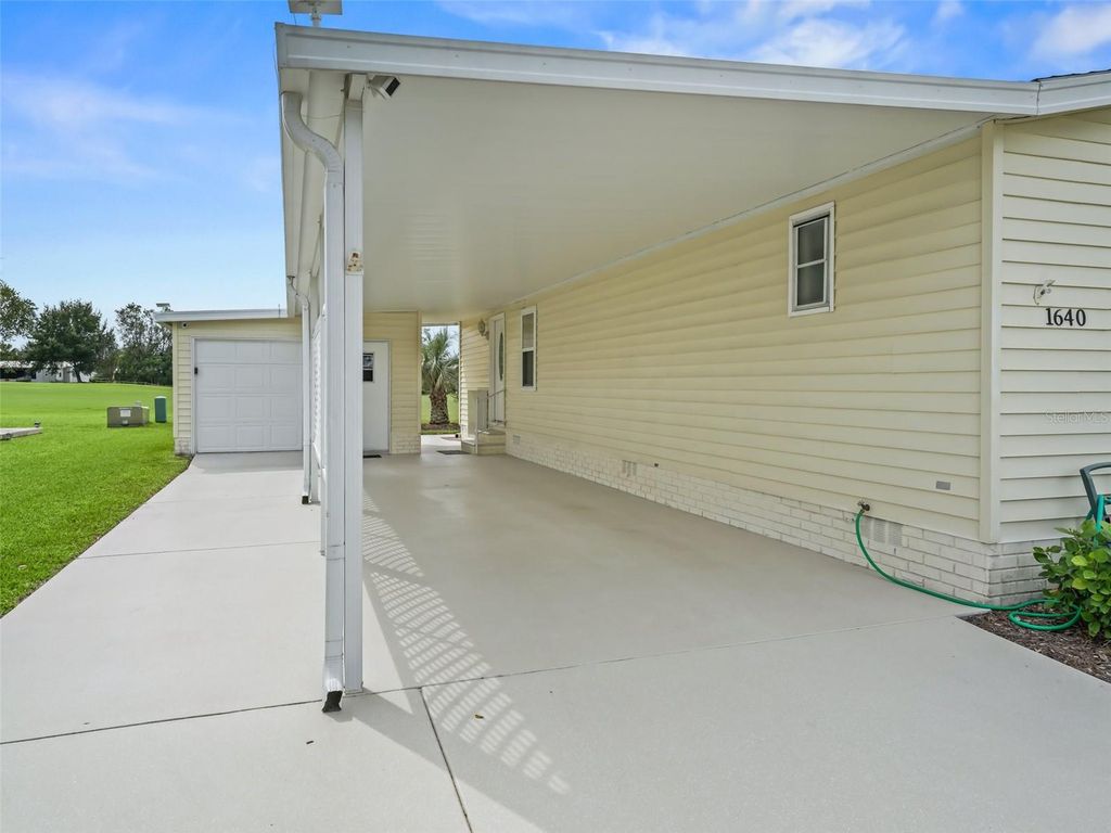 Photo of 1640 Magnolia Avenue, The Villages, FL 32159 (MLS # OM705574)