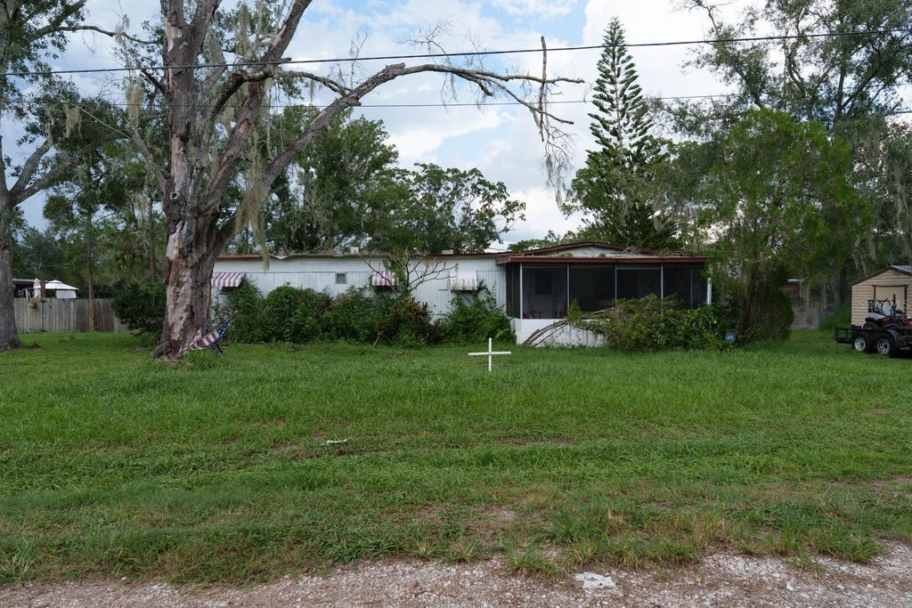 Photo of 1005 Grandaddy Lane, Lutz, FL 33548 (MLS # O6444562)