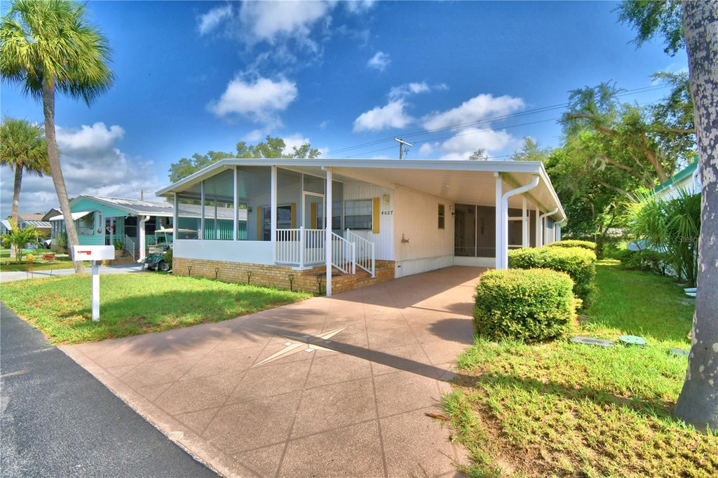 Photo of 4027 Rolling Oaks Drive, Winter Haven, FL 33880 (MLS # P4939266)