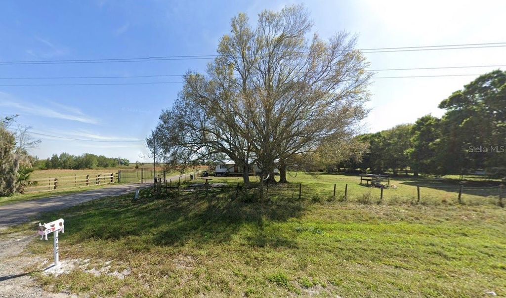 Photo of 702 NW 160th Street, Okeechobee, FL 34972 (MLS # C7518504)