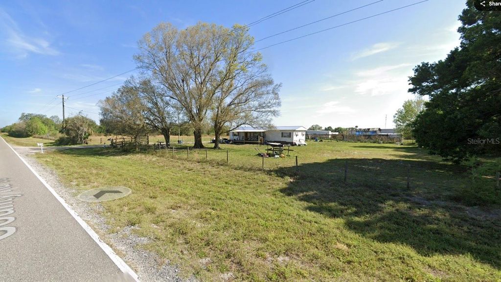 Photo of 702 NW 160th Street, Okeechobee, FL 34972 (MLS # C7518504)
