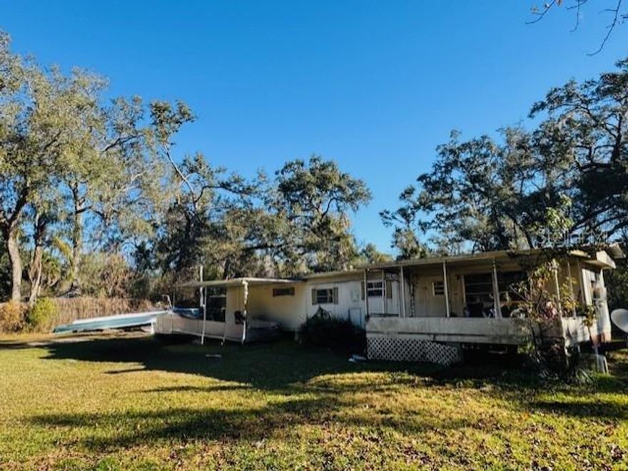 Seller Motivated! Price Improvement in place! Enjoy country living with the convenience of town nearby! This fixer-upper sits on an extra-large lot that is over 1/2 acre of cleared land with beautiful mature trees. The property includes a singlewide mobile home with a front and rear porch. This home is a fixer upper. Equipped with a private well and septic, this property is ideally located near the Withlacoochee State Forest, perfect for nature lovers and outdoor enthusiasts. Convenient access to Hwy 50/Cortez Blvd, Hwy 301, I-75, and the Florida Turnpike makes commuting easy. You’re just minutes from shopping, dining, community events, and the popular Webster Flea Market, and centrally located between Tampa and Orlando. Plus, enjoy being within 45 minutes to an hour of Florida’s beautiful beaches and natural springs. A great opportunity for those seeking space, location, and potential! This property is currently tenant occupied. The opportunity to keep it an income property with a seasoned tenant. The possibilities for this property are endless. This Owner has additional properties that are available and will consider selling all together for one price. All properties are income rental properties.