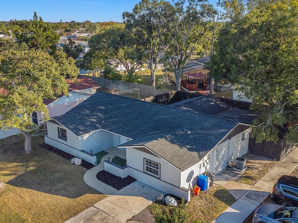 Photo of 7210 Embassy Boulevard, Port Richey, FL 34668 (MLS # TB8448698)