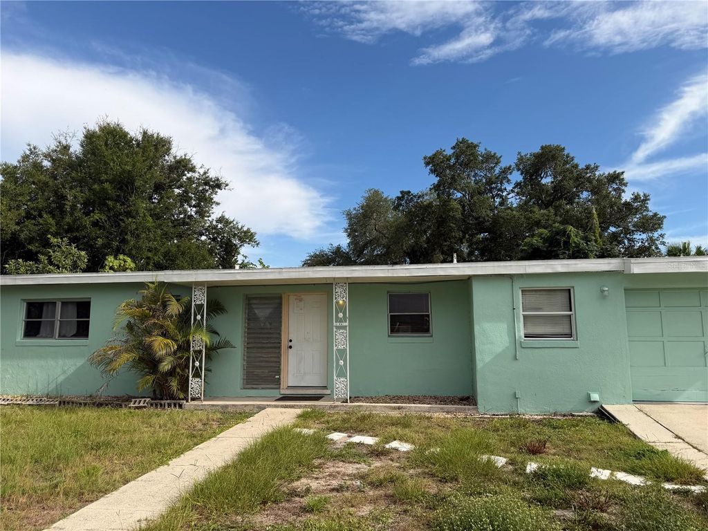 Photo of 21077 Gertrude Avenue, Port Charlotte, FL 33952 (MLS # D6147940)
