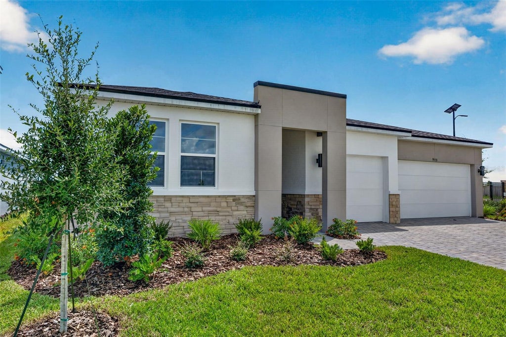 Photo of 9553 Natural Oak Point, Dade City, FL 33525 (MLS # TB8499903)