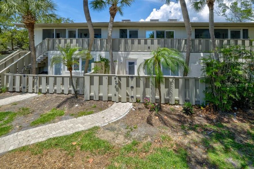 ...shortstories "  Just imagine your boat or kayak is out the back door..551 steps and you are swimming on the blue torquise water of the  Gulf of America .You live on an island of Longboat key. This beautifully  first floor residence offers tranquil Bay views, easy Bay access and your own boat dock--  Enjoy  water views from the living room and entertainer's kitchen, thoughtfully redesigned with new cabinetry, countertops and stainless steel appliances.  Every detail has been updated after the subject property was hit by hurricane in 2024.. including a new washer and dryer, Located in the highly sought-after Whitney Beach Bayside community, residents enjoy exceptional amenities such as two heated pools, fishing dock, kayak launch and storage, boat slips.  A flexiable  rental policy allows one month rentals up to six times annualy.  Dogs  are allowed bring Rover  just bring lassie ...Just steps across the street is deeded beach access where you can stroll the powdery soft sand, swim in the turquoise Gulf waters, and take in breathtaking sunsets.  Tennis and pickleball courts, barbecue and picnic areas and charming tiki huts are available to residents.   Whitney Beach is located close to shopping areas and has many excellent restaurants.  You are only a few miles from world famous St. Armands Circle and downtown Sarasota for cultural events.  This is coastal living at its finest!!!
