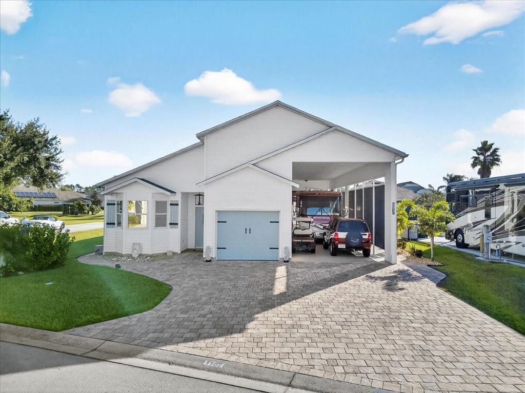 Photo of 1102 Motorcoach Drive, Polk City, FL 33868 (MLS # L4956583)