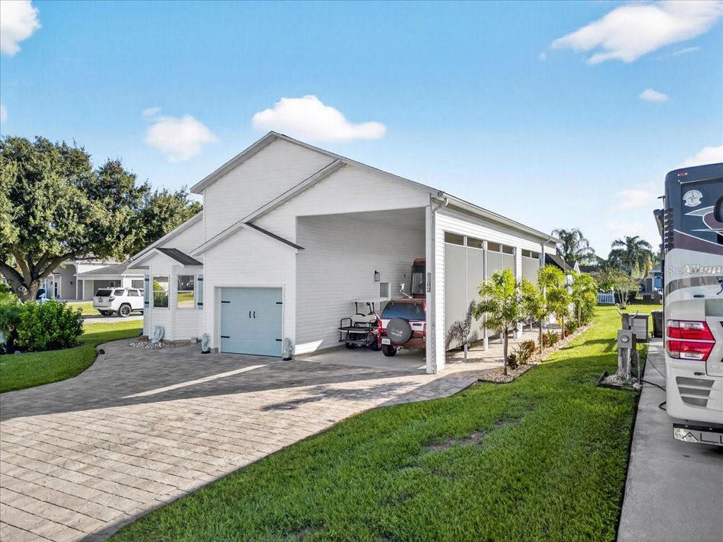 Photo of 1102 Motorcoach Drive, Polk City, FL 33868 (MLS # L4956583)