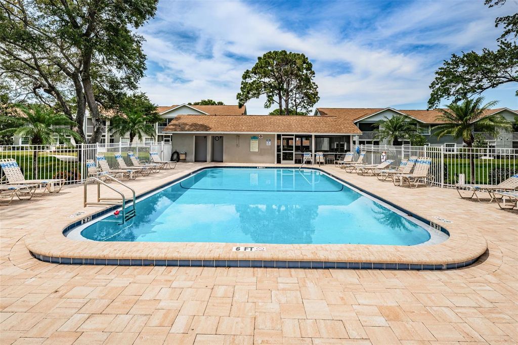 Photo of 1460 Oak Hill Drive #103, Dunedin, FL 34698 (MLS # TB8443416)