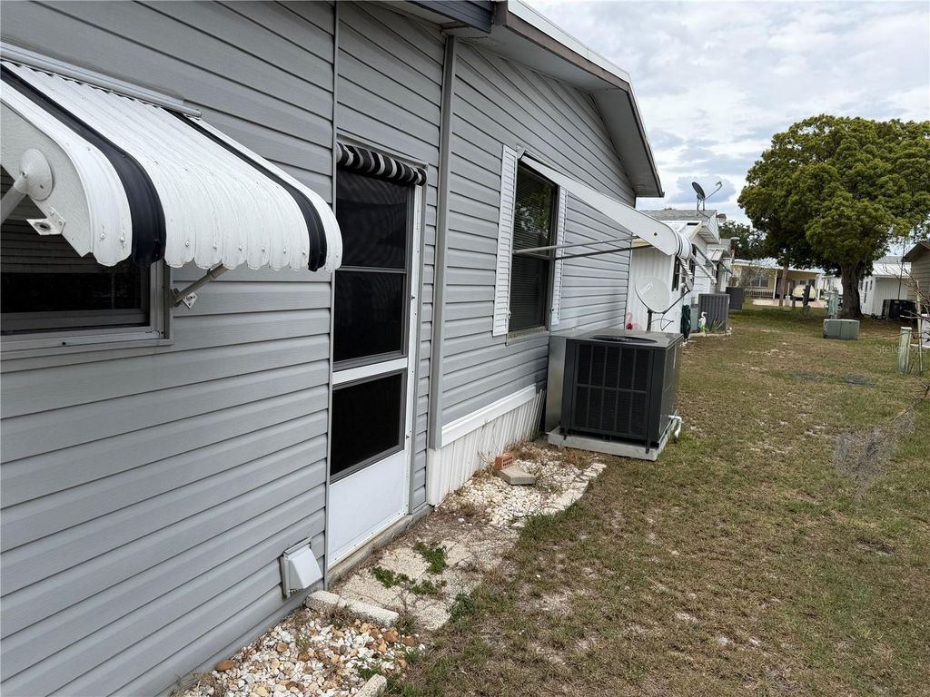 Photo of 4038 Rolling Oaks Drive, Winter Haven, FL 33880 (MLS # B4902243)