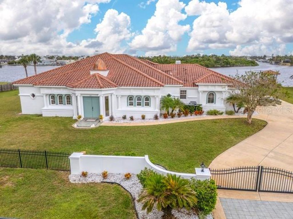 Photo of 660 Lambert Avenue, Flagler Beach, FL 32136 (MLS # FC312541)