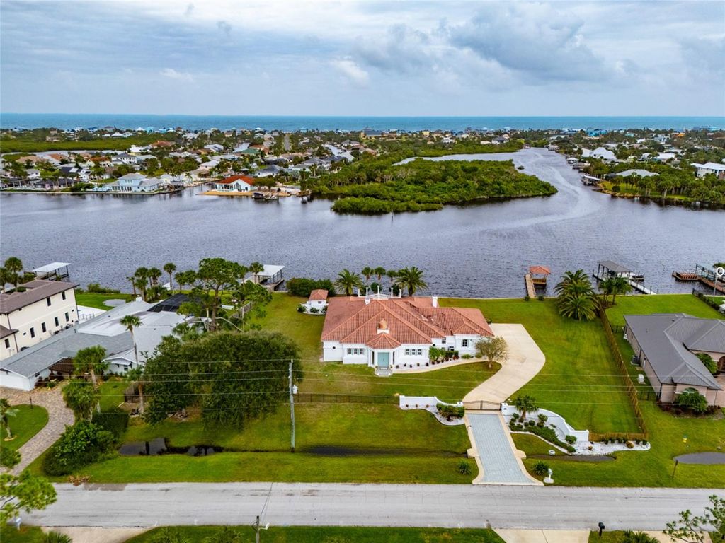 Photo of 660 Lambert Avenue, Flagler Beach, FL 32136 (MLS # FC312541)
