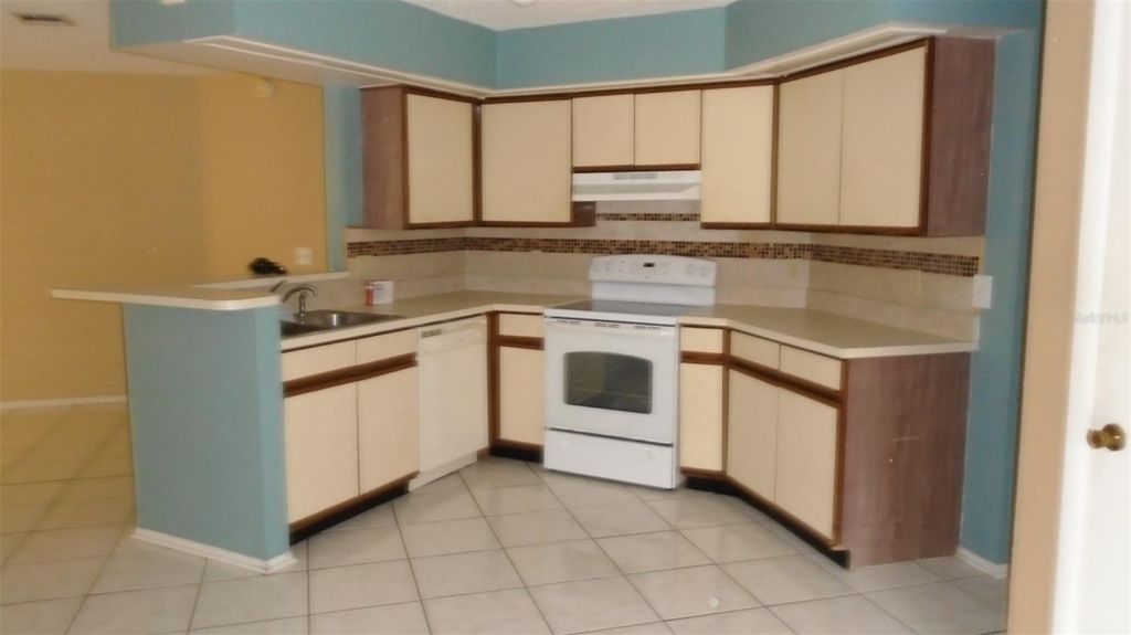 Photo of 13107 Los Angeles Woods Lane, Orlando, FL 32824 (MLS # O6404593)