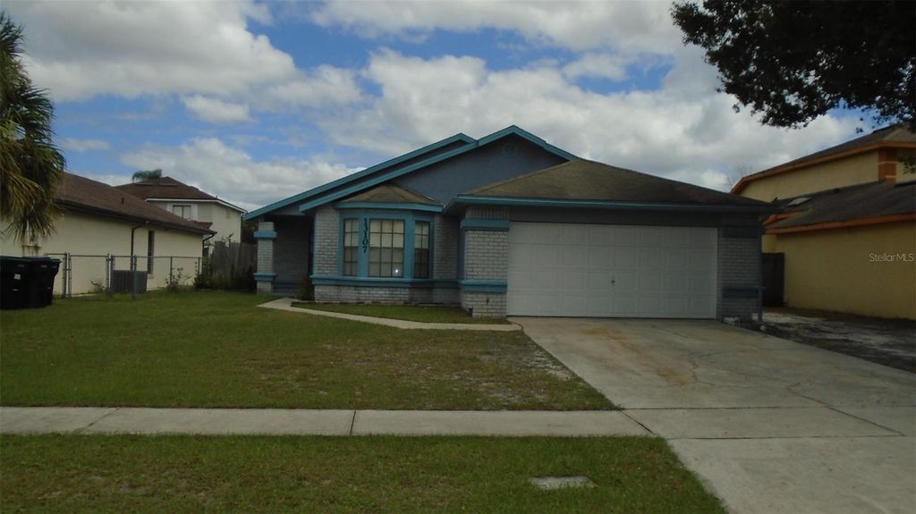 Photo of 13107 Los Angeles Woods Lane, Orlando, FL 32824 (MLS # O6404593)
