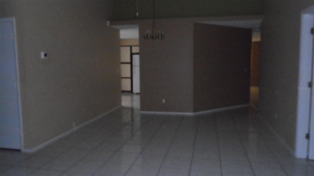 Photo of 13107 Los Angeles Woods Lane, Orlando, FL 32824 (MLS # O6404593)
