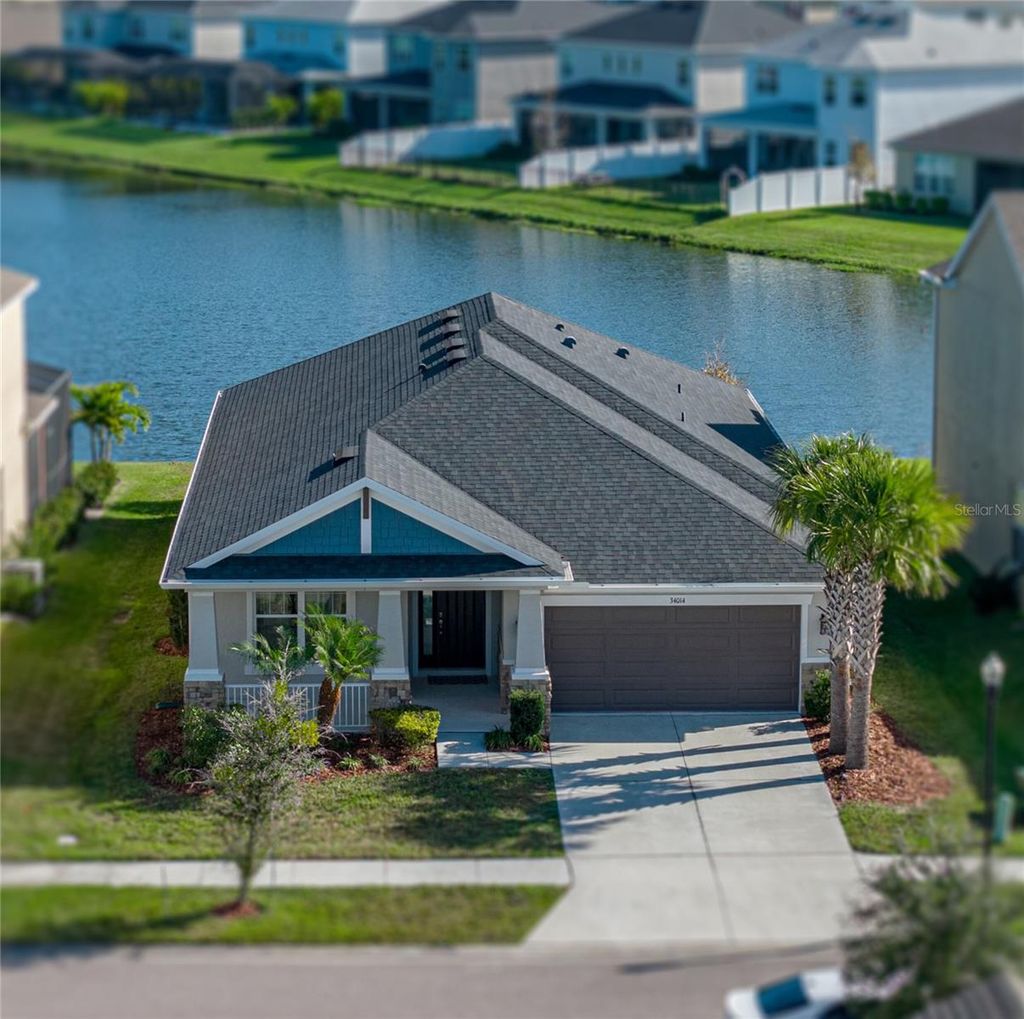 Photo of 34014 Astoria Circle, Wesley Chapel, FL 33545 (MLS # TB8449141)