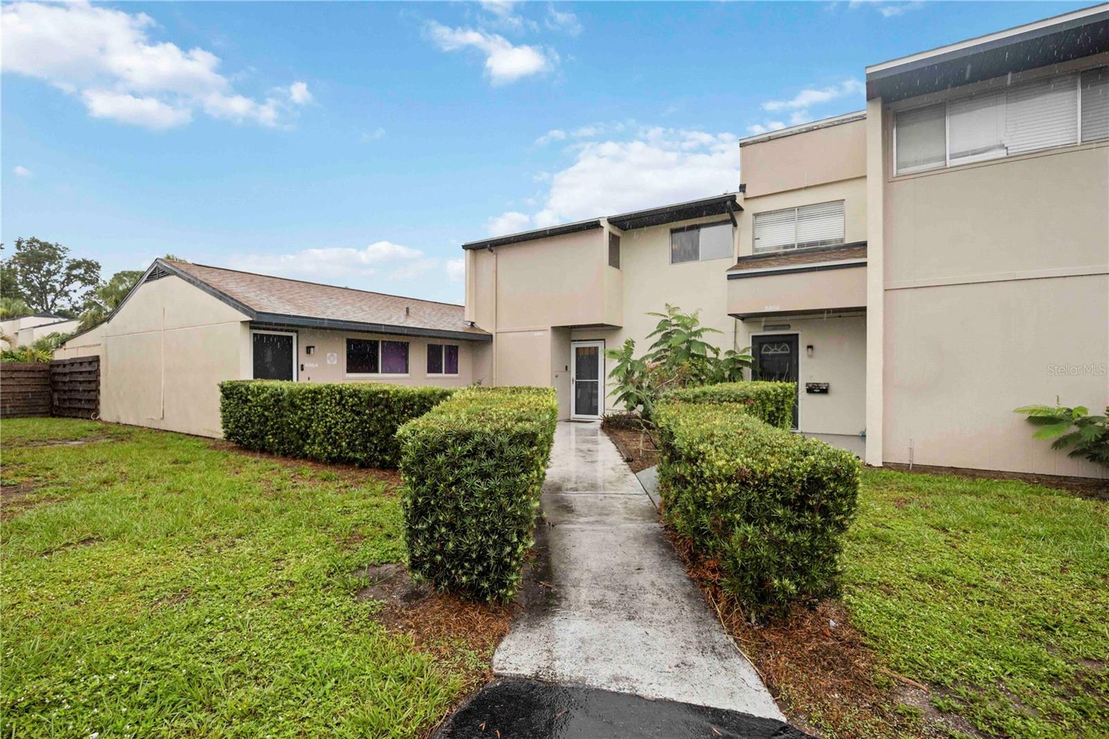 Price improvement! Now priced more competitively, this home offers generous square footage and strong value compared to similar homes currently on the market. Located just minutes from the Gulf beaches and downtown Sarasota, this updated 3 bedroom, 2.5 bath condo offers well maintained living space with recent upgrades. A brand new roof and a newly constructed private wood deck, both completed in 2025, provide added value and enhanced outdoor living. The kitchen features updated appliances, ample storage, and a walk in pantry. Flooring throughout the home combines durable tile and warm laminate, creating an inviting and easy to maintain environment. A convenient half bath is located on the main level, ideal when guests are over. Upstairs, each bedroom offers its own sense of comfort and character filled with soft natural light, thoughtful layouts, and just the right amount of space to unwind, work, or recharge. Step outside to a private patio area with a screened in porch, offering versatile space for gardening, additional storage, or a peaceful spot to enjoy morning coffee and the gentle coastal breeze. The community is bordered by trees, providing a tranquil and private setting away from the city’s pace. Enjoy community amenities including a pool and playground, all just minutes from beautiful beaches, shopping, and dining, making this condo a great place to call home in Sarasota.