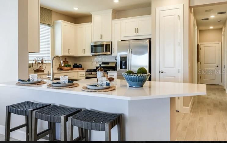 7487 MOONBEAM AVENUE