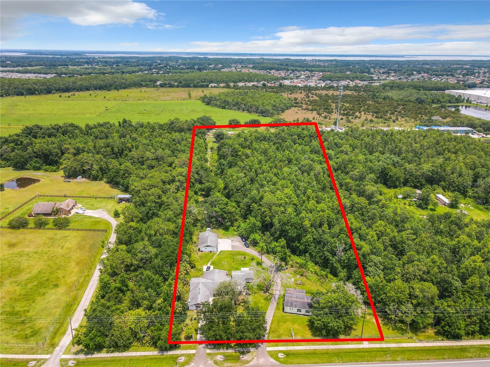 9.88 ACRES OF PROPERTY ON HAM BROWN ROAD IN FAST-GROWING KISSIMMEE. SEE THE ATTACHED DOCUMENTS FOR ADDITIONAL INFORMATION REGARDING THE ZONING/MIXED USE. THIS IS A GREAT OPPORTUNITY TO OWN A GREAT LOT IN ONE OF THE FASTEST-GROWING AREAS IN CENTRAL FLORIDA. THERE ARE 3 BUILDINGS ON THE PREMISES. THE FIRST ONE IS A LARGE HOME, 5/3, AND 2 KITCHEN AREAS. THE SECOND BUILDING IS BEING UTILIZED AS A CHURCH AND IT HAS 2 BATHROOMS. THE THIRD BUILDING IS A TRIPLE-WIDE MOBILE HOME.