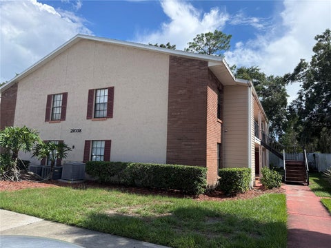 Photo of 21038 Voyager Boulevard #4, Land O Lakes, FL 34638 (MLS # TB8545029)