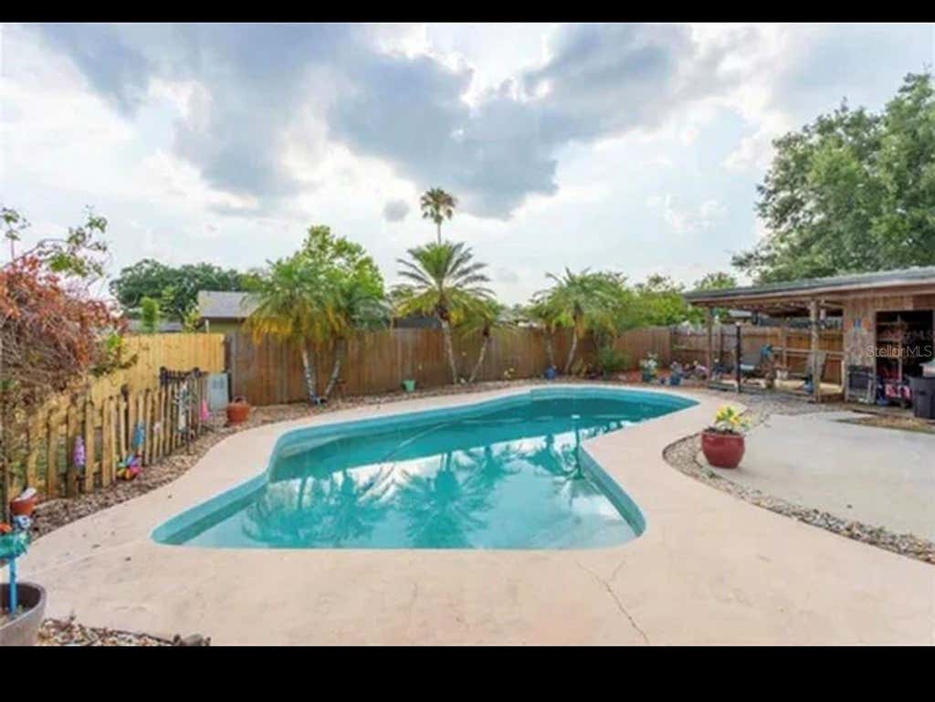 Photo of 6126 Burhley Court, Orlando, FL 32809 (MLS # O6433536)