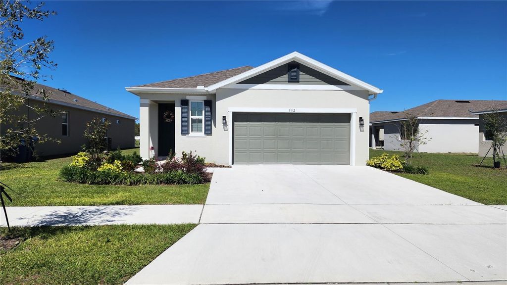 Photo of 932 Blue Creek Drive, Haines City, FL 33844 (MLS # O6412298)
