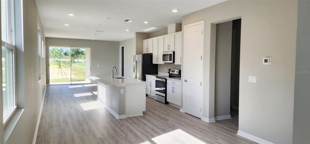 Photo of 932 Blue Creek Drive, Haines City, FL 33844 (MLS # O6412298)