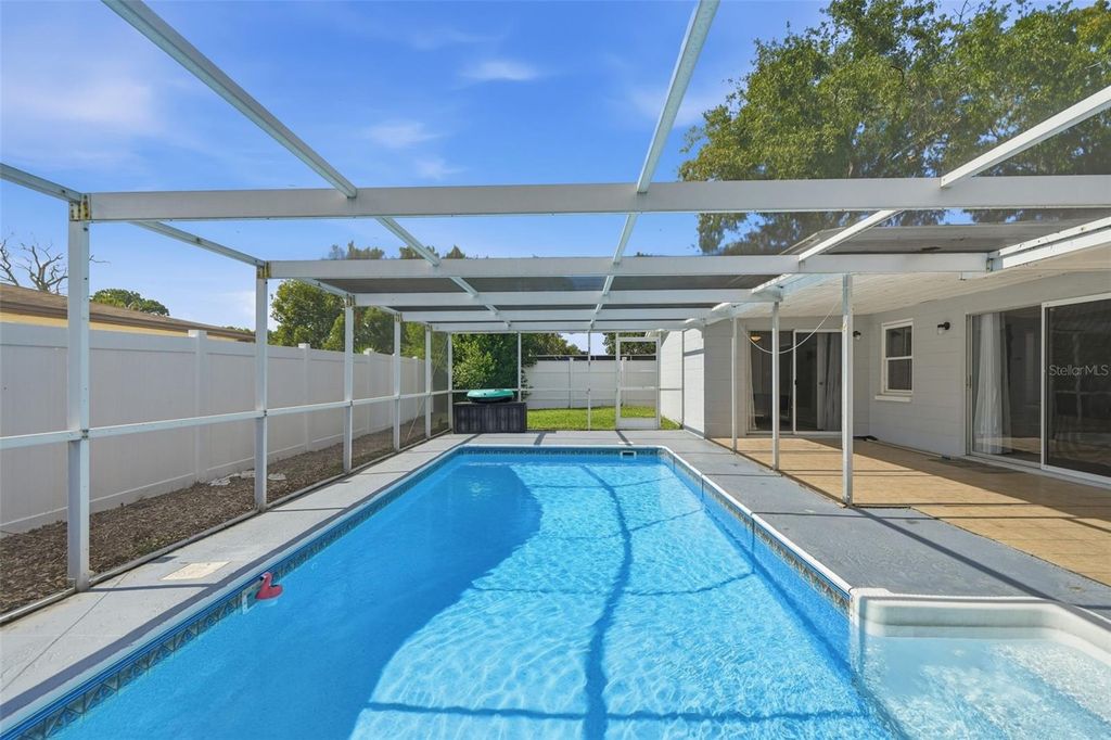 Photo of 7540 San Moritz Drive, Port Richey, FL 34668 (MLS # W7880489)