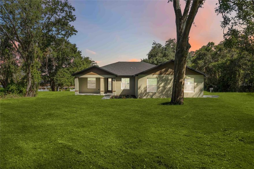 Welcome to 11110 Oleander Drive in the heart of Clermont! This beautifully maintained home offers the perfect blend of comfort, style, and Florida living. Featuring 5 bedrooms and 3 bathrooms, an open-concept floor plan, and abundant natural light, this residence is designed for both relaxation and entertaining.The spacious kitchen boasts granite countertops/stainless steel appliances/custom cabinetry, flowing seamlessly into the dining and living areas. Enjoy quiet mornings or gatherings on the covered patio/screened lanai overlooking the private backyard with lake view. The primary suite includes a walk-in closet and spa-inspired bathroom, creating a true retreat. Located in a desirable Clermont neighborhood, this property offers easy access to shopping, dining, top-rated schools, and major highways—while still being close to Clermont’s charming waterfront and recreational parks. Don’t miss this opportunity to own a stunning home in one of Central Florida’s most sought-after communities. Schedule your showing today!