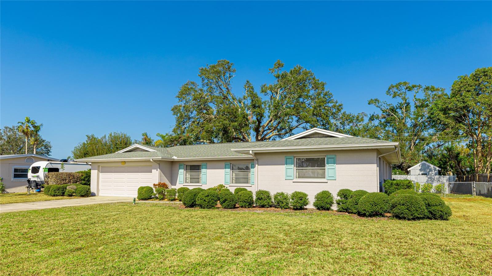 PRICED IMPROVED! Take a look at this charming WEST BRADENTON CLASSIC! Nestled on a extra wide street, this home is steps from vibrant restaurants, shopping, and medical facilities, with Florida’s stunning BEACHES just a short drive away. Discover a spacious, open floor plan flowing seamlessly into a large, fenced backyard featuring a shed—perfect for pets, play, or gardening. Enjoy the FREEDOM of NO HOA fees and NO DEED RESTRICTIONS! Perfect for your Home Residence or AirBNB alike!
Recent upgrades include a FULLY REMODELED KITCHEN with sleek NEW APPLIANCES, a WINE FRIDGE, and plenty of storage, NEW INTERIOR PAINT, updated bathroom vanities, new ceiling fans and modern light fixtures. This 3-bedroom, 2-bathroom home has a DEDICATED LAUNDRY ROOM with sink, a 2-car garage, and inviting curb appeal. Move-in ready with a LOTS OF CHARACTER. Schedule your private tour today!