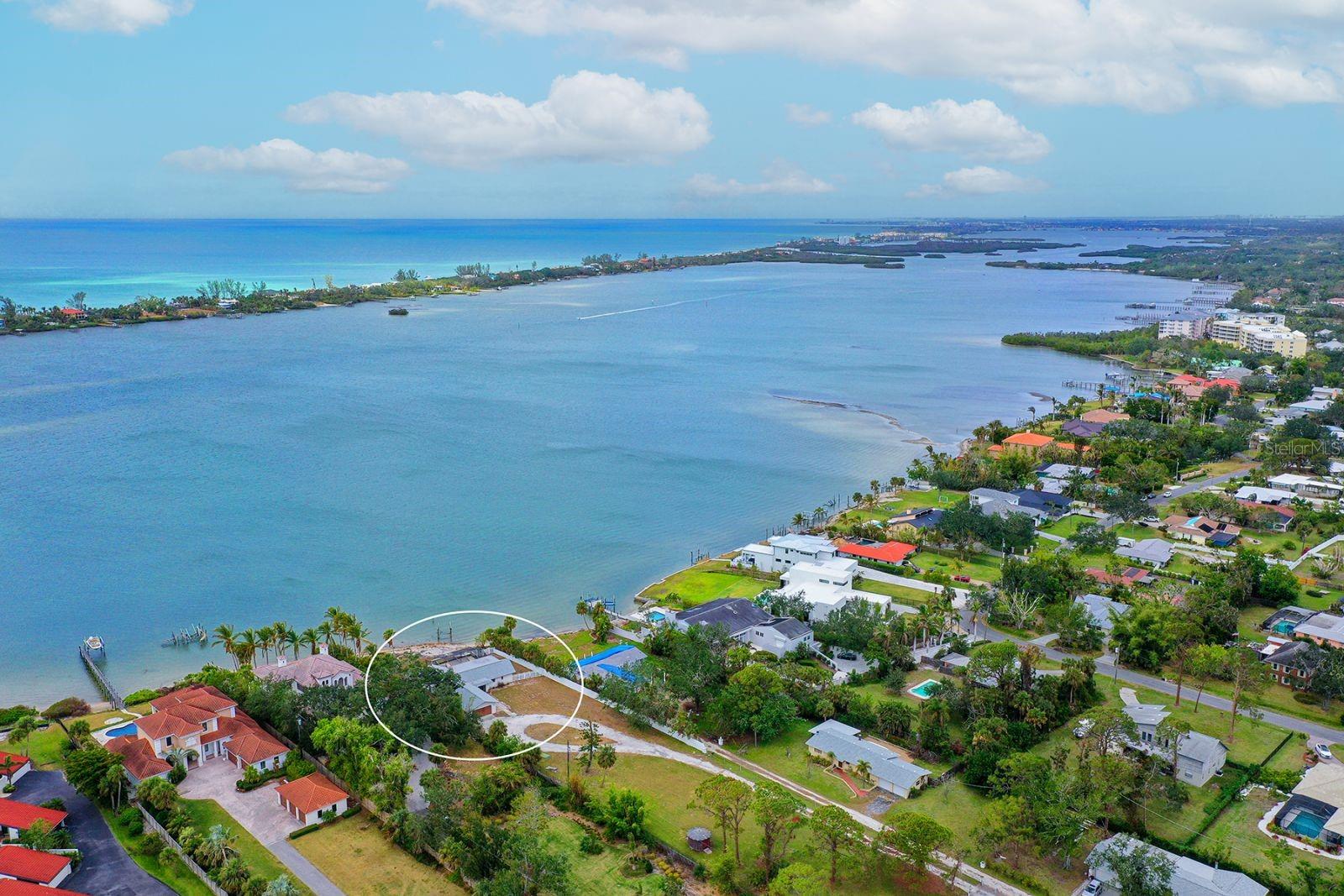 One or more photo(s) has been virtually staged. Stunning Waterfront Property on Little Sarasota Bay! Discover a rare opportunity to own a magnificent estate lot on the Intracoastal Waterway in beautiful Osprey, Florida. This exceptional property features 100 feet of prime waterfrontage; Dock and boat lift grandfathered in, making it a boater’s dream!
Nestled on a spacious 1.23-acre lot, this private estate size acreage offers ample space to build your dream home while enjoying the charm of the existing ranch-style house. Stunning sunset views abound from the living room, primary bedroom and dining area, as well as from the expansive pool deck, which surrounds a large, heated pool and spa. The current home features 2 bedrooms plus a bonus room/den, 3 baths, all on a single level at a ground elevation of 13 feet.
Whether you’re looking to build your dream home or enjoy the existing charming ranch, this property promises breathtaking sunsets and a serene waterfront lifestyle.
Close to Casey Key and the Nokomis beaches and all that nearby Sarasota has to offer: Dining, Shopping and the Arts. Don’t miss out on this unique opportunity in Sarabay Acres!
