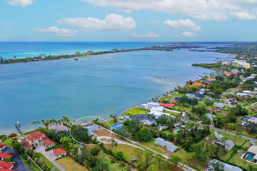One or more photo(s) has been virtually staged. Stunning Waterfront Property on Little Sarasota Bay! Discover a rare opportunity to own a magnificent estate lot on the Intracoastal Waterway in beautiful Osprey, Florida.  This exceptional property features 100 feet of prime waterfrontage; Dock and boat lift grandfathered in, making it a boater’s dream!
Nestled on a spacious 1.23-acre lot, this private estate size acreage offers ample space to build your dream home while enjoying the charm of the existing ranch-style house. Stunning sunset views abound from the living room, primary bedroom and dining area, as well as from the expansive pool deck, which surrounds a large, heated pool and spa. The current home features 2 bedrooms plus a bonus room/den, 3 baths, all on a single level at a ground elevation of 13 feet. 
Whether you’re looking to build your dream home or enjoy the existing charming ranch, this property promises breathtaking sunsets and a serene waterfront lifestyle.
Close to Casey Key and the Nokomis beaches and all that nearby Sarasota has to offer: Dining, Shopping and the Arts. Don’t miss out on this unique opportunity in Sarabay Acres!