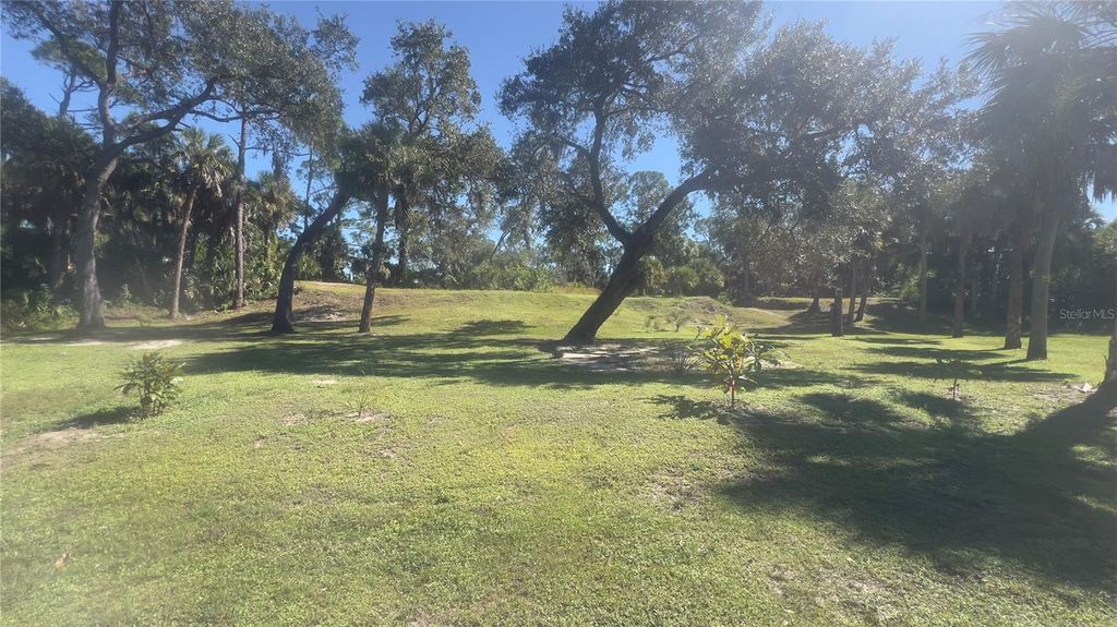 Photo of 128 Prineville Street, Port Charlotte, FL 33954 (MLS # C7517146)