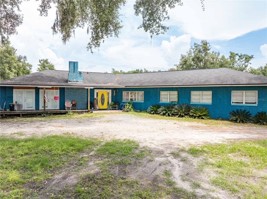 Rural residential property suitable for an automotive repair business on-site. The 6.26-ac. lot has partial fencing for horses, cows, or other farm animals. The 2,490-square-foot home features four bedrooms, two bathrooms, a den, a living room, an enclosed porch, and an upgraded kitchen with modern systems. Recent improvements include a new roof (2017), updated HVAC, remodeled bathrooms, and ceramic tile flooring throughout. In the rear yard is a 2,800-square-foot auto repair shop with a detached office. The shop includes recessed service lanes designed for wheel alignment and undercarriage inspections. A unique opportunity for a home business.