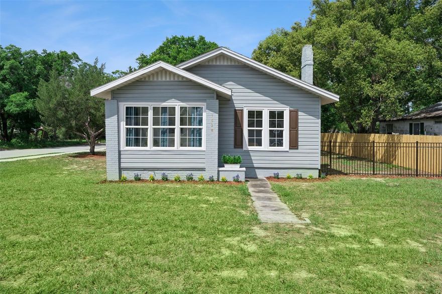 Beautifully updated and move-in ready, this charming 2-bedroom, 1.5-bath home sits on a spacious corner lot with NO HOA, just minutes from downtown Eustis and Mount Dora. Offering the perfect blend of character and modern upgrades, this home features a bright, inviting layout filled with natural light and thoughtful design throughout.

The fully renovated kitchen is a standout, complete with upgraded granite countertops, newer stainless steel appliances, custom cabinetry, and a stylish tiled backsplash. Both bathrooms have been tastefully updated, including a guest bath with a custom-tiled rainfall shower, granite vanity, and vessel sink. The primary bedroom offers dual closets and a convenient attached half bath, along with an in-home laundry area with room for a full-size washer and dryer.

The living spaces are full of charm, featuring a decorative brick fireplace and an oversized foyer that serves as a cozy Florida room, offering approximately 77 sq ft of additional flexible living space. Complete with a brand-new window AC unit, it’s ideal for a cozy sitting area, home office, or hobby space. Tile flooring runs throughout for durability and easy maintenance, complemented by fresh interior paint, ceiling fans, and updated lighting.

Step outside to enjoy the large lot with plenty of room for parking, RV or boat storage, and all your toys—plus a 50 amp hookup with water access, making it even more functional for outdoor living or travel-ready setups.

Major updates include a NEW ROOF (April 2026) and AC (2020), providing added peace of mind. With its prime location, modern upgrades, and unique character, this home offers an exceptional opportunity to enjoy the best of Central Florida living.