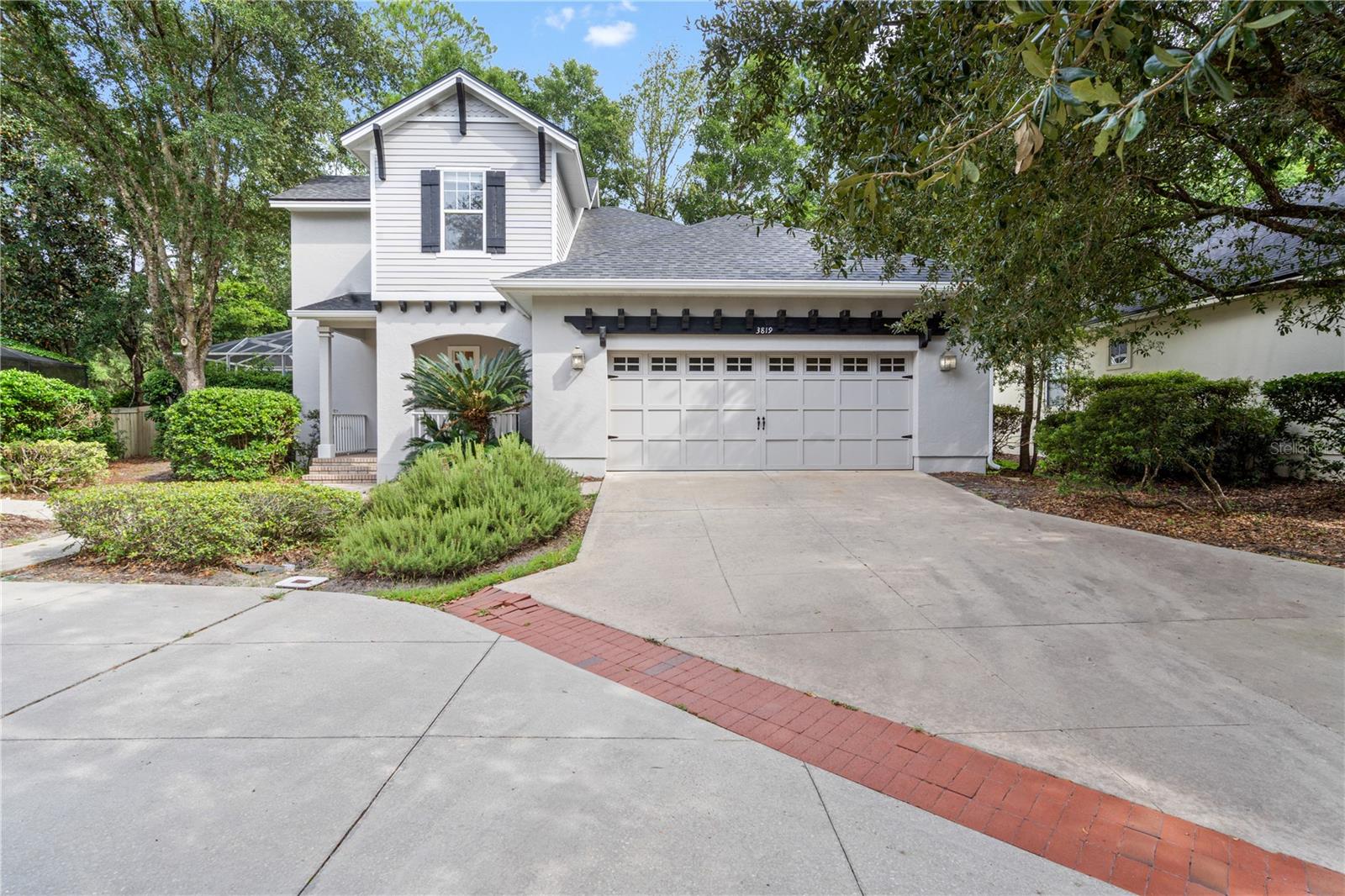 Step into timeless elegance with this Haile Plantation home, showcasing tray ceilings, a skylit kitchen, and a heated pool. Designed for comfort and style, the open living area with fireplace and expansive primary suite create the perfect retreat—all just steps from dining, shops, and shaded neighborhood paths, and minutes from UF, Shands Medical Center, and Gainesville’s best entertainment.